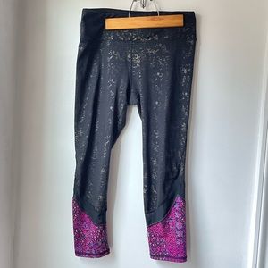 Shiny gold and purple capri leggings